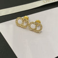 Dior CD Drop Earrings Gold Cubic Zirconia